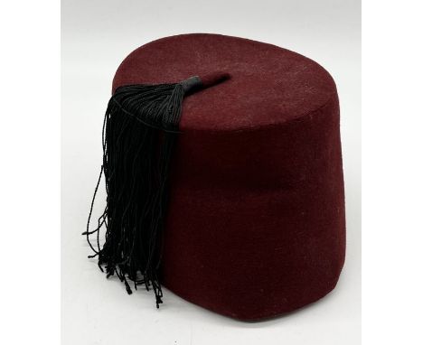 A vintage Fez hat made by El-Hag Ahmed Serag, Cairo