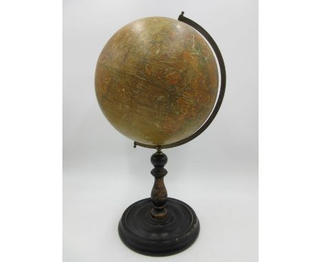 A vintage "Geographia" 10 inch terrestrial globe on ebonised wooden stand