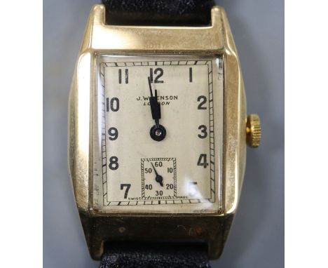 A gentleman's late 1940's 9ct gold manual wind wrist watch, retailed by J.W. Benson, with rectangular Arabic dial and subsidi