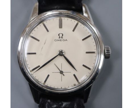 A gentleman's 1960's? stainless steel Omega Seamaster manual wind wrist watch, with baton numerals and subsidiary seconds, on