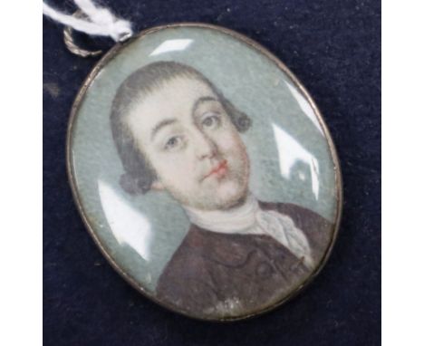 Late 18th century English School, oil on ivory, Miniature portrait of a gentleman in a brown coat 3.5 x 3cm