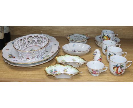 A collection of Herend porcelain tableware, including two oval serving dishes, one decorated with pink flowers, the other wit