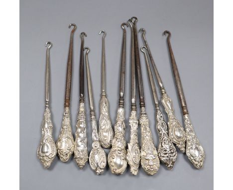 Eleven assorted mainly early 20th century silver handled button hooks.
