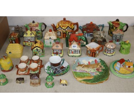 A quantity of cottage ceramic teapots / pastille burners