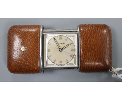 A 1930's steel and leather cased Movado travelling watch.