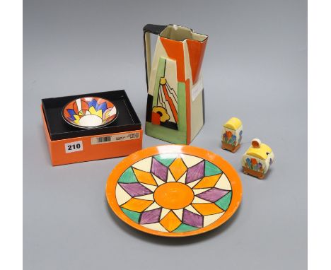 A Clarice Cliff Bizarre plate, a crocus cruet, a modern Clarice Cliff dish and a Clarice Cliff-style jug