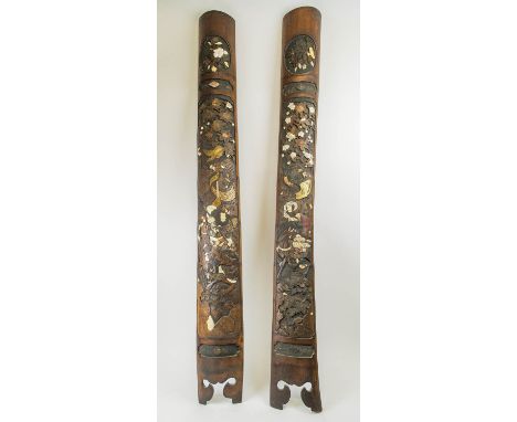 JAPANESE SHIBAYAMA BAMBOO WALL HANGINGS, a pair, intricately carved with scrolling foliate detail, horse mounted warriors wit