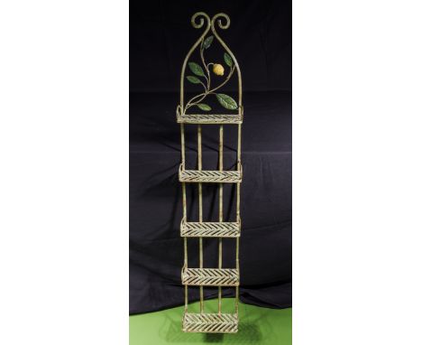 A decorative metal wall shelf