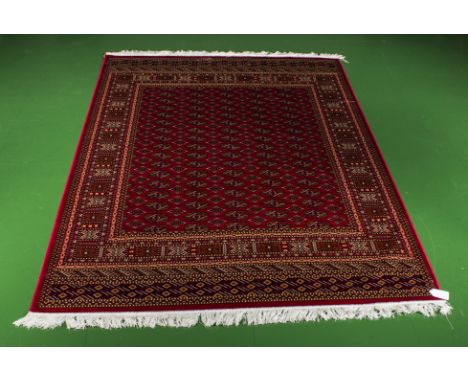 A red ground Bokhara carpet, 2.30m 1.60m