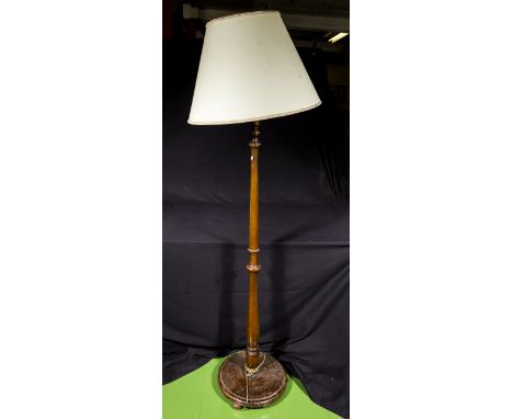 A standard lamp and shade