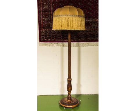 A standard lamp and shade