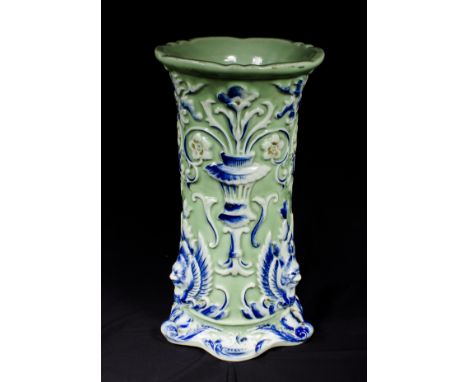 A Japanese 19th century celadon glazed stick stand