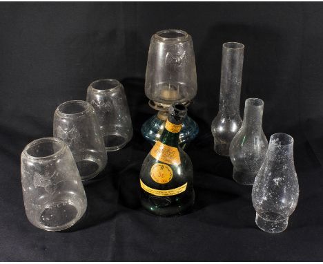 Glass oil lamp chimneys an oil lamp base and other items