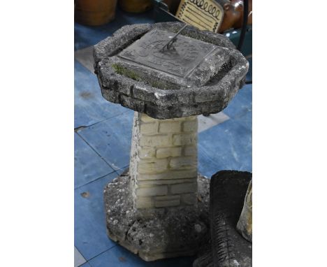 A Reconstituted Stone Garden Sundial with Brick Stylised Support, 62cm high 