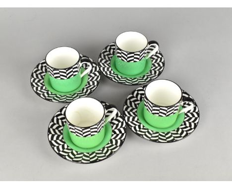 A Set of Four Mintons Art Deco Coffee Cans and Saucers Decorated with Black and White Pattern Top and Green Fill Bottom (Some