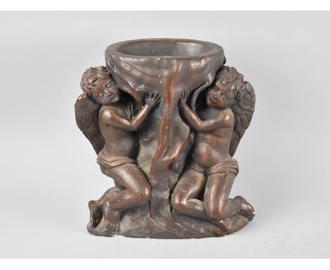 A Mid 20th Century Bronze Effect Moulded Table Centre Stand in the Form of Two Seated Cherubs, 30cm High 
