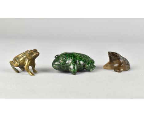 A Collection of Three Small Frogs, in Bronze, Smokey Quartz and Green Flecked Marble 