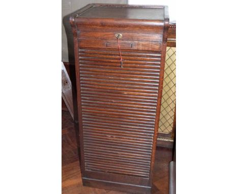 Early 20th century oak filing cabinet with roller door and nine slides No condition reports for this sale