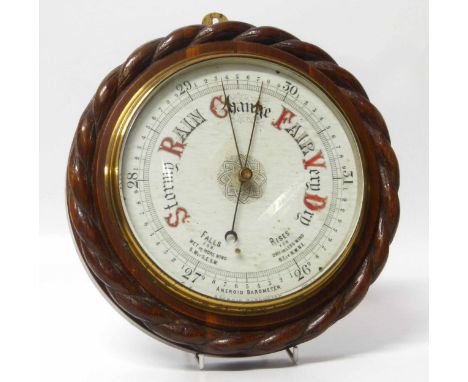 Edwardian oak case circular aneroid barometer, 29cm diamter with rope edge No condition reports for this sale