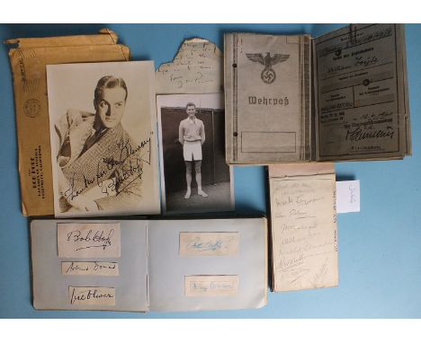 An autograph album containing 35 signatures, mainly film and radio stars, including Bing Crosby, Flanagan & Allen, Bob Hope, 