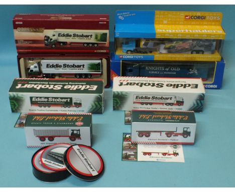 A Corgi CC18004 Eddie Stobart lorry, two other Corgi lorries, four Atlas Eddie Stobart lorries, all boxed and a tin of Eddie 