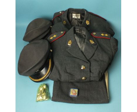 Queen Alexandra Royal Army Nursing Corps: two uniform jackets, one skirt, two caps, a quantity of buttons and a badge.