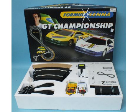 Scalextric a G T Championship motor racing set, comprising cars, track and accessories, etc, boxed.