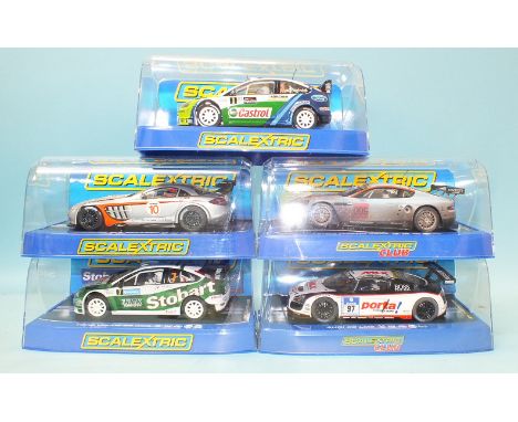 Five modern Scalextric cars by Hornby Hobbies Ltd, all in plastic boxes.