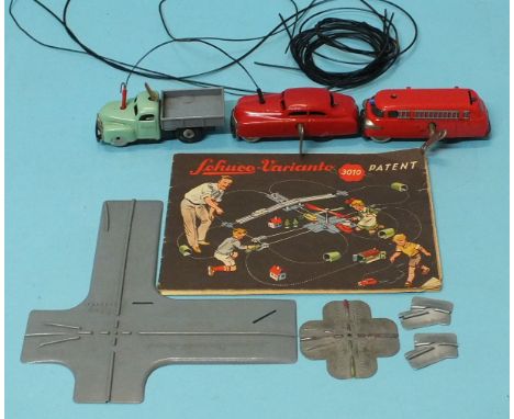 Schuco Varianto, a c/w tin plate car and fire engine, a c/w tinplate and plastic truck, two crossing and two turning plates, 