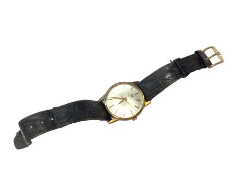 1970s Tissot 9ct gold cased wristwatch on leather strap, case diameter 32mmTotal weight 28.1 grams. The watch is currently ru