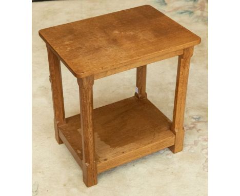 Workshop of Robert 'Mouseman' Thompson a rectangular oak side table with lower shelf. Dimensions approx 43cm x 32cm x 47cm. W