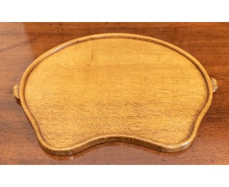 Workshop of Robert 'Mouseman' Thompson a oak kidney shaped tray with raised edge. Dimensions approx 47cm wide, depth approx 3