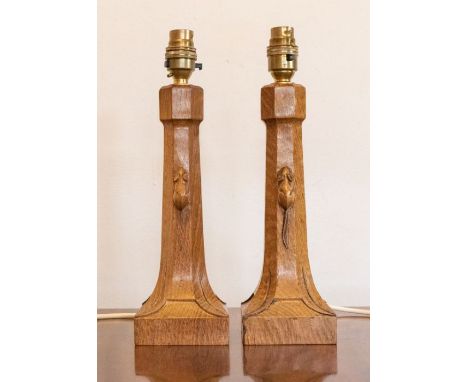 Workshop of Robert 'Mouseman' Thompson a pair of oak table lamps. Height approx 31cm. No signs of damage.