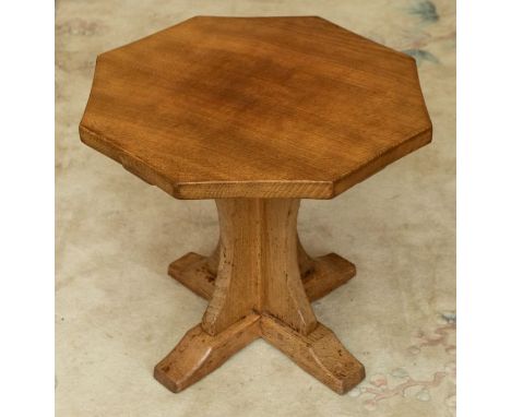 Workshop of Robert 'Mouseman' Thompson a octagonal oak side table. Dimensions approx 50cm x 47.5cm. No signs of damage.