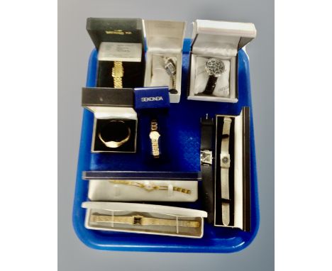 A tray containing a collection of boxed and unboxed lady's wristwatches including Timex, Sekonda, Pulsar.