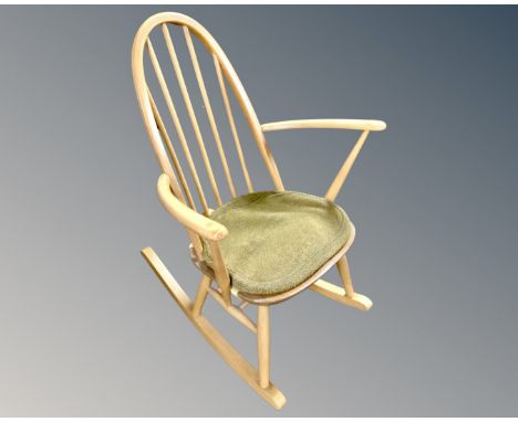 An Ercol elm and beech rocking chair.