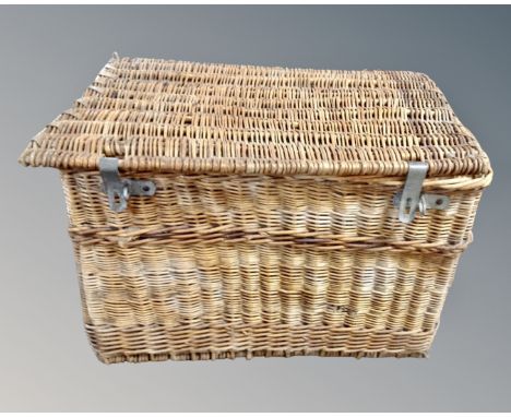 A vintage wicker oversized laundry hamper (width 102cm)