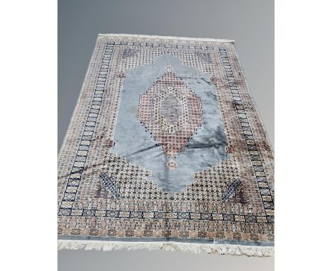 A Bidjar carpet, West Iran, on blue ground, 305 cm x 213 cm