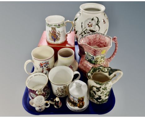 A tray containing assorted ceramics including Maling jug, Portmeirion vase, Poole vase, commemorative tankards etc.