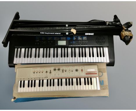 A Casio CTK-1200 electric keyboard with lead on stand and a Casiotone MT-46 keyboard (boxed)