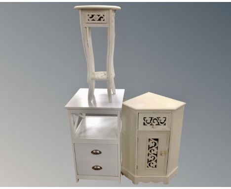 A contemporary two drawer bedside stand together with a lamp table fitted with a drawer and a corner cabinet fitted with a dr