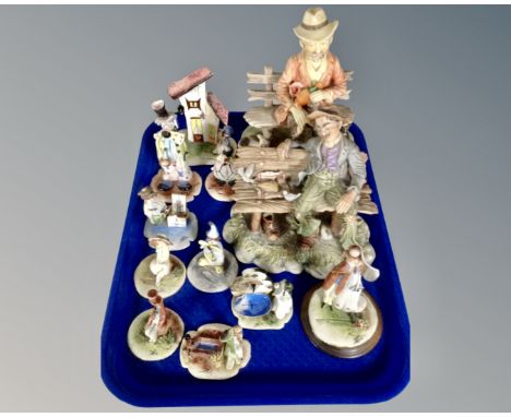 A tray containing Italian ceramic figures, clowns, tramp on bench etc.