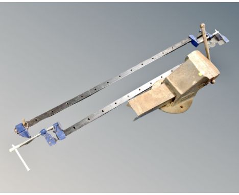 A Paramo no. 6 bench vice, together with two sash clamps.