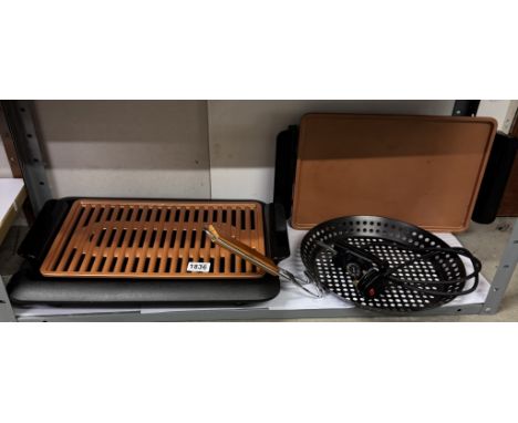 A kitchen utensil plate warmer