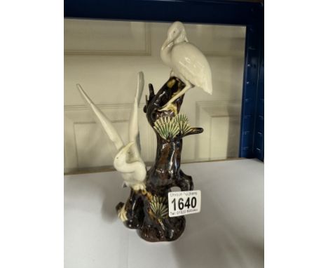 A vintage ceramic Heron bird group on a tree, height 24cm