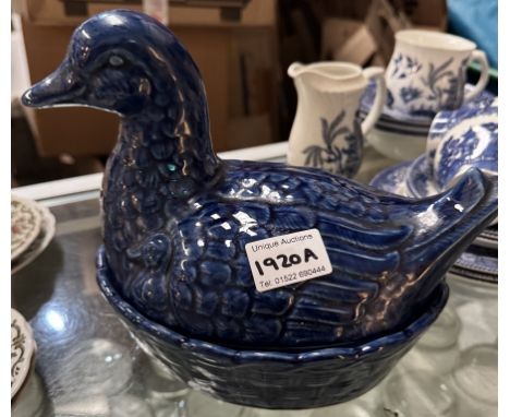 A blue glazed ceramic duck egg storage pot