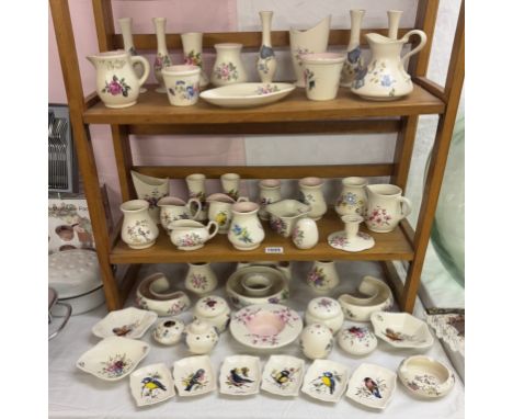 A large collection of Axe Vale pottery (3 shelves)