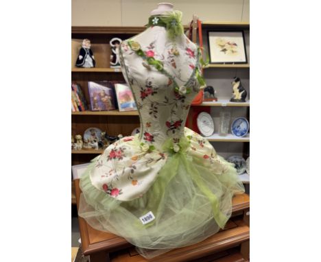 A decorative mannequin display torsoHole in bottom for display. Height 62cm, Chip to top rim of wood neck.