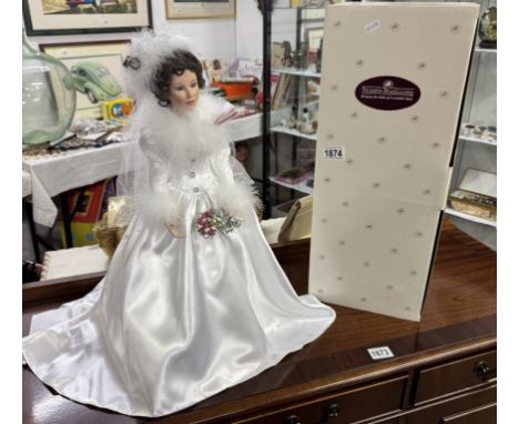 A boxed Ashton-Drake porcelain Doll 'Winter Romance' No: 879FF