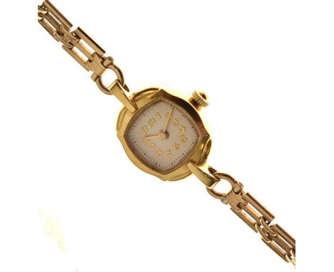 Lady's cocktail watch, the case stamped 18k on a 9ct gold gate link bracelet, quartz movement   Condition: 